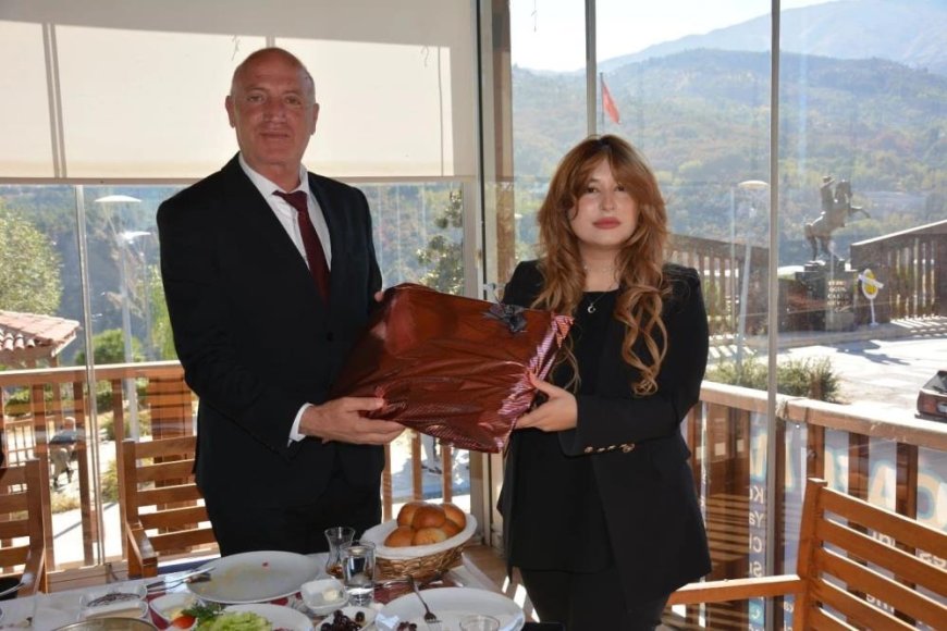 Başkan Kumral ve muhtarlar Kaymakam İlter'e veda etti